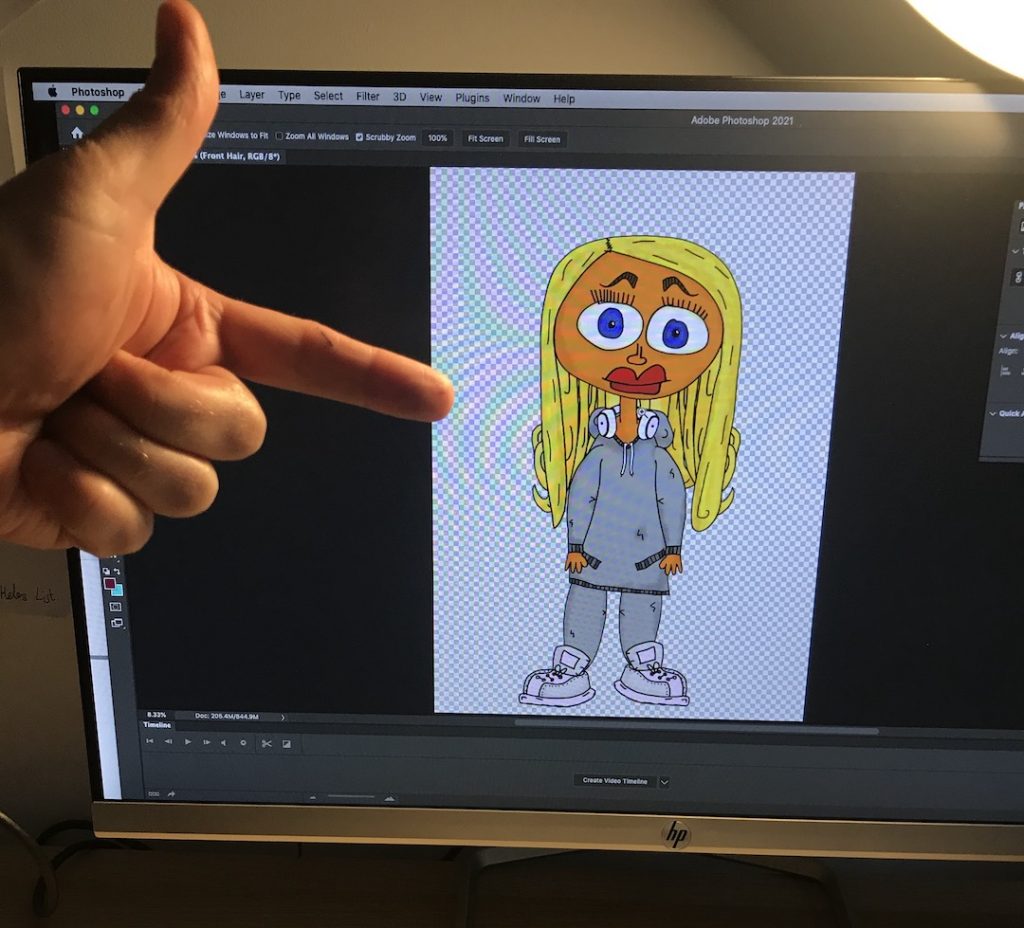 A finger points at an illustration of Cinderella on a computer screen