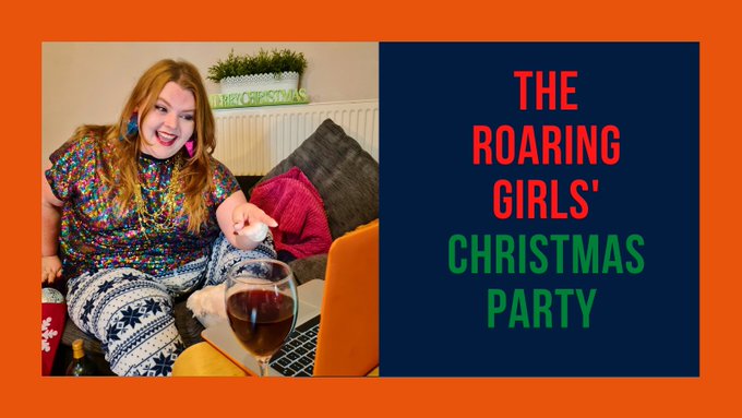 Photo of one of the Roaring Girls in Christmas pyjamas laughing and pointing at her laptop